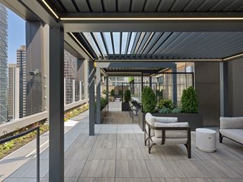 A patio with a wooden floor 